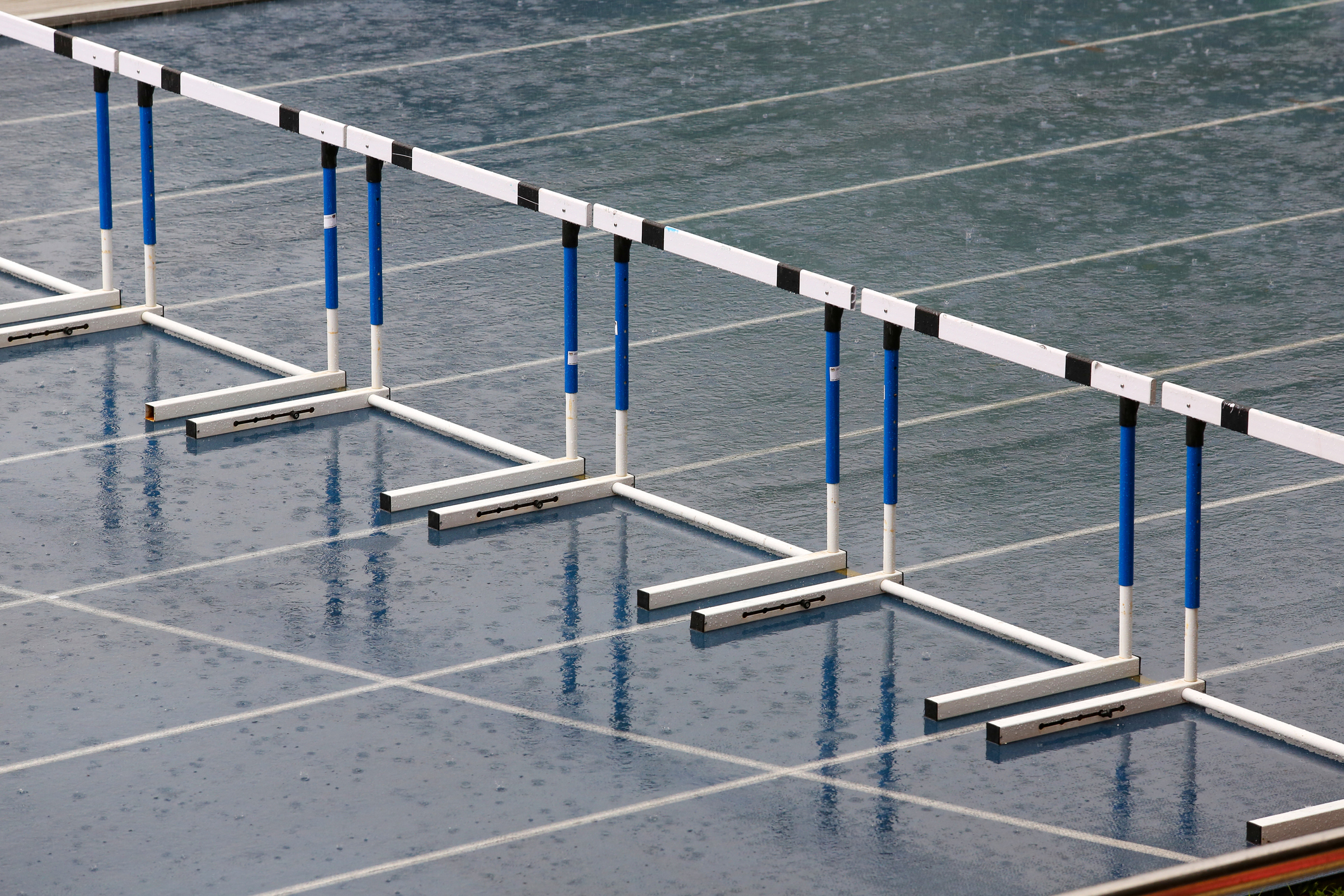 hurdles disposed under rain