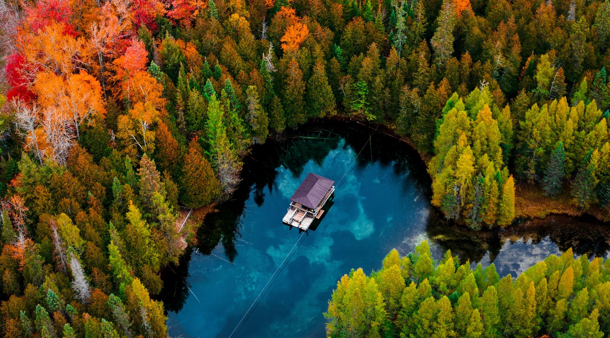 Drone/Aerial image of Kitch-iti-kipi, a freshwater spring in the Upper Peninsula of Michigan.